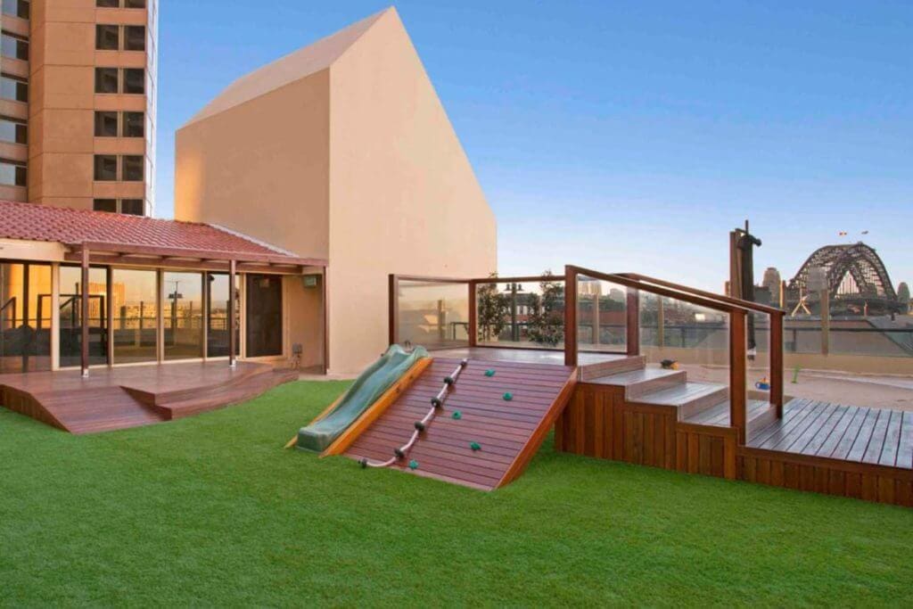 Outdoor play area at Wonder Garden Learning Center featuring age-appropriate play equipment, open space, and a safe, engaging environment