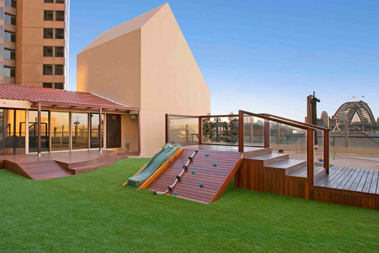 Outdoor play area at Wonder Garden Learning Center featuring age-appropriate play equipment, open space, and a safe, engaging environment